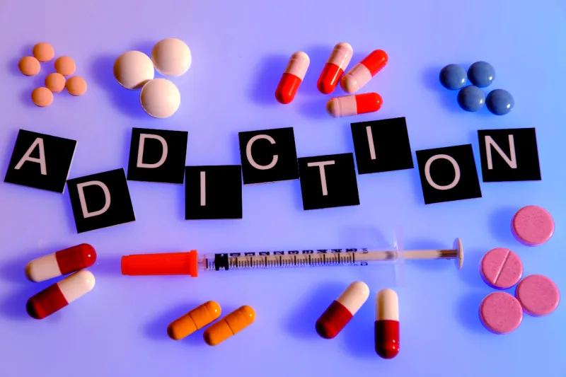 drugs, medication, syringes, and other symbols of drug addiction