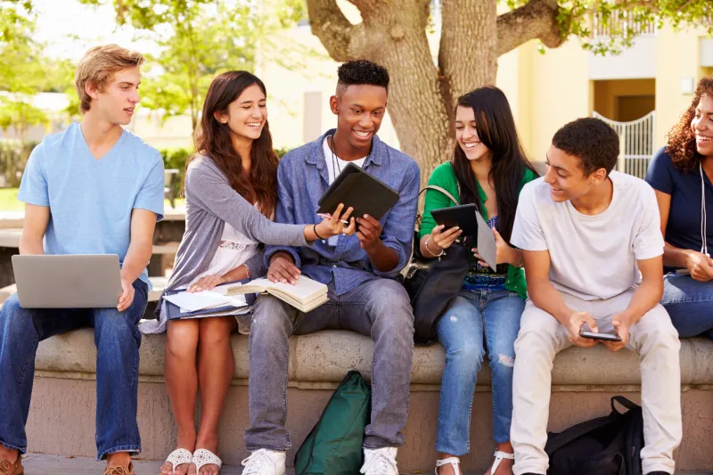 High school students having fun studying together